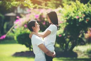 Young couple hugging and relaxing together photo