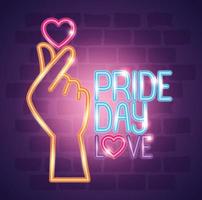 pride day neon light with hand and heart vector