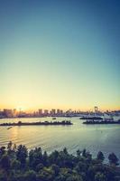 Cityscape of Tokyo city with the Rainbow bridge photo