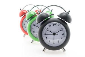 Alarm clocks on white background photo