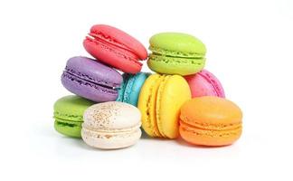 Colorful macarons on white background photo
