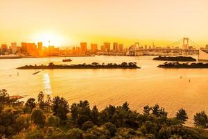 Cityscape of Tokyo city with the Rainbow bridge photo