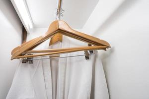 Robe and wood hangers photo