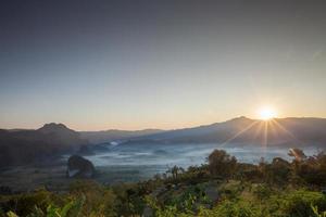 Sunrise over mountains photo