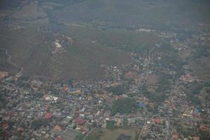 Aerial view of a village on a hill photo