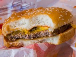 Close-up of a burger with a bite in it photo