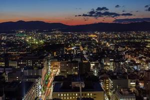 Aerial view of the city at sunset photo