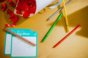 Top view of a desk with pens photo