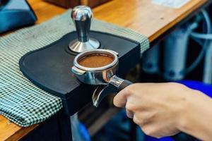 Close-up of making coffee photo