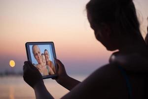 Family taking a selfie on vacation photo