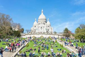 Tourists on Montmartre near Basilica Sacre Coeur, Paris photo