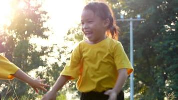 Happy mother and daughters playing and running. video