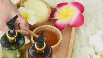 A Hand Mixing Honey for A Spa Massage video