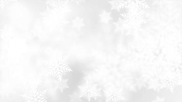 Schleife Draufsicht Schneeflocke, die auf weiße Winterzeit fällt video