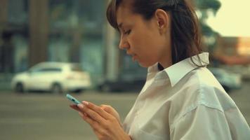 Businesswoman Scrolling Over News and Social Media Outdoors video