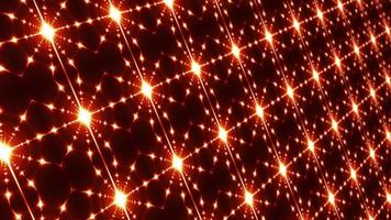 Orange glowing stars pulsing in a matrix wall video