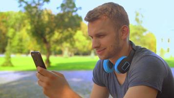 Young Guy Writes SMS on The Phone video