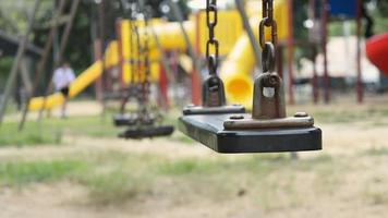 Empty swings on the playground video