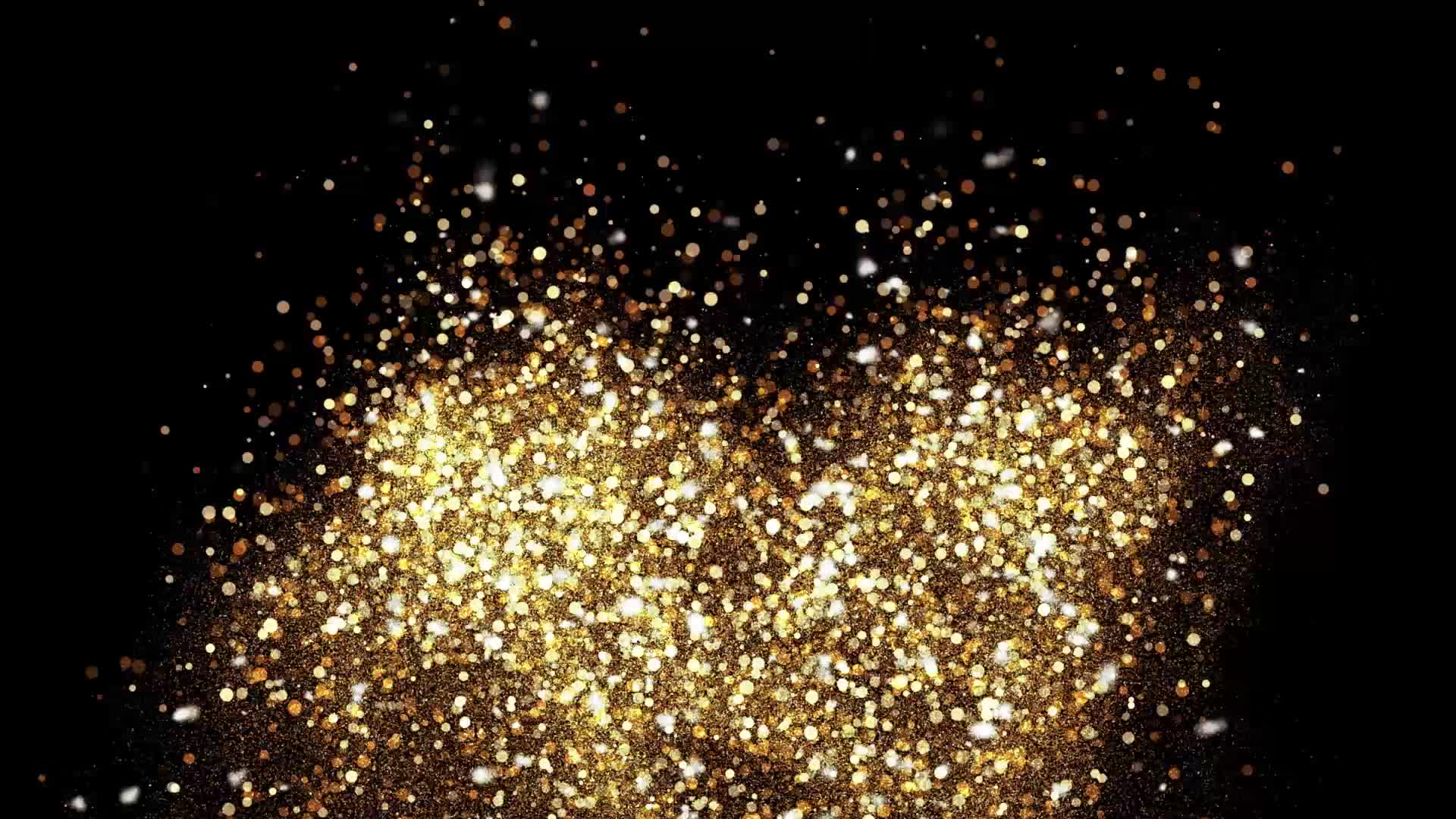 Gold shimmering particle on black background for celebration. 2015842