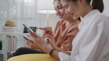 Woman with Friend using Smartphone and Tablet video
