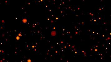 Abstract red and orange flame spheres on black screen video