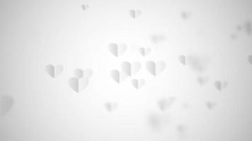 Schleifen weiße Herzen fliegen auf weißem Velentine Hintergrund video