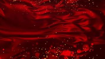 particules de poussière flottant sur le tissu satiné vague rouge video