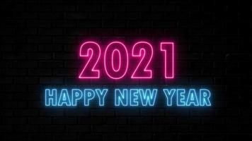 movimento della luce al neon testo felice anno nuovo 2021 cicli di corsa blu e rosa video