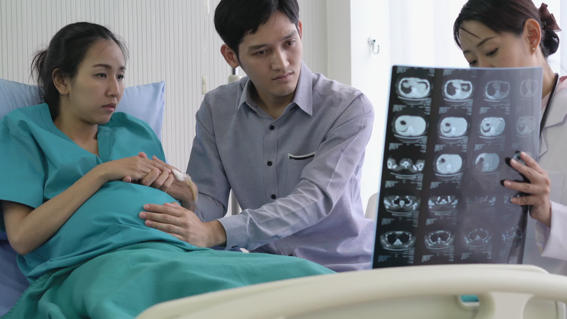 1920px x 1080px - Asian Man and Pregnant Woman Getting Serious News from Doctor. 2018063  Stock Video at Vecteezy