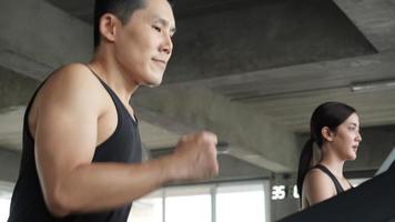 Athletic Man Running on Treadmill at Gym. video