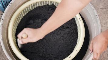 Mixing of soil in the basket. video