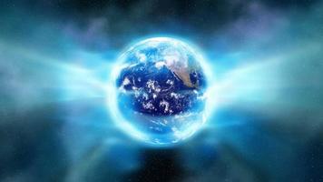 uma aura de luz envolve o planeta Terra video