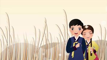 Cute couple in traditional hanbok dress in the meadow. video