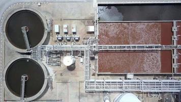 Aerial Drone view move up from clarifier sedimentation tank. Aerial view Water treatment plant.  video