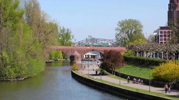 Main River and Bridge and People in Frankfurt video