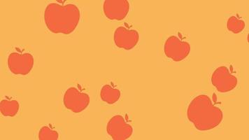 pommes orange vif se déplaçant sur un fond orange clair