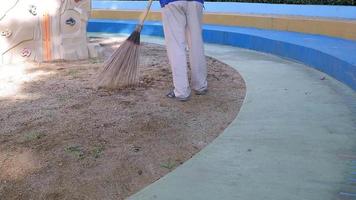 Janitor Cleaning Outdoor Auditorium