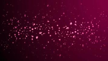 Shining pink particles dust motion background video