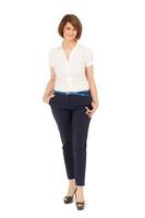 Woman in a white shirt and jeans photo