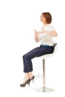 Woman talking in a chair photo
