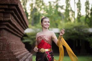 Beautiful woman wearing a typical Thai dress photo