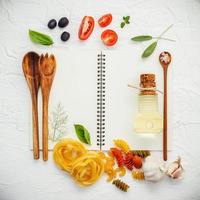 Cooking ingredients on a blank book photo