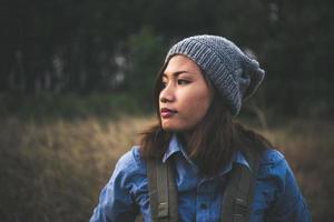 Vintage summer lifestyle fashion portrait of young hipster woman photo