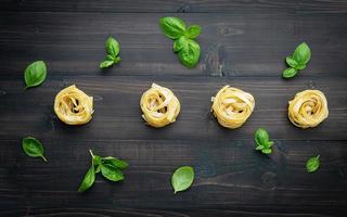 Fresh pasta and basil photo