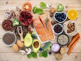 Healthy ingredients on a wooden background photo