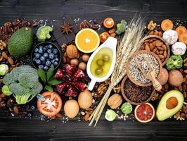 Healthy ingredients on a dark wooden background photo