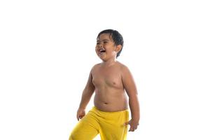 Happy little cute Asian boy cute smiling to camera isolated on white background photo