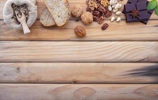 Fresh ingredient border on wood with copy space photo