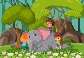 Escena del bosque con niños jugando con un elefante. vector