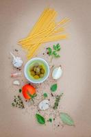 Spaghetti ingredients on kraft paper photo